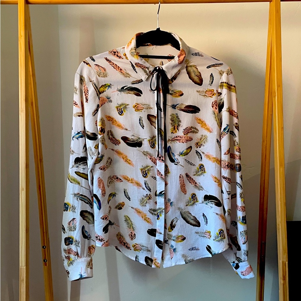 Feather print shirt with covered placket, size 2
